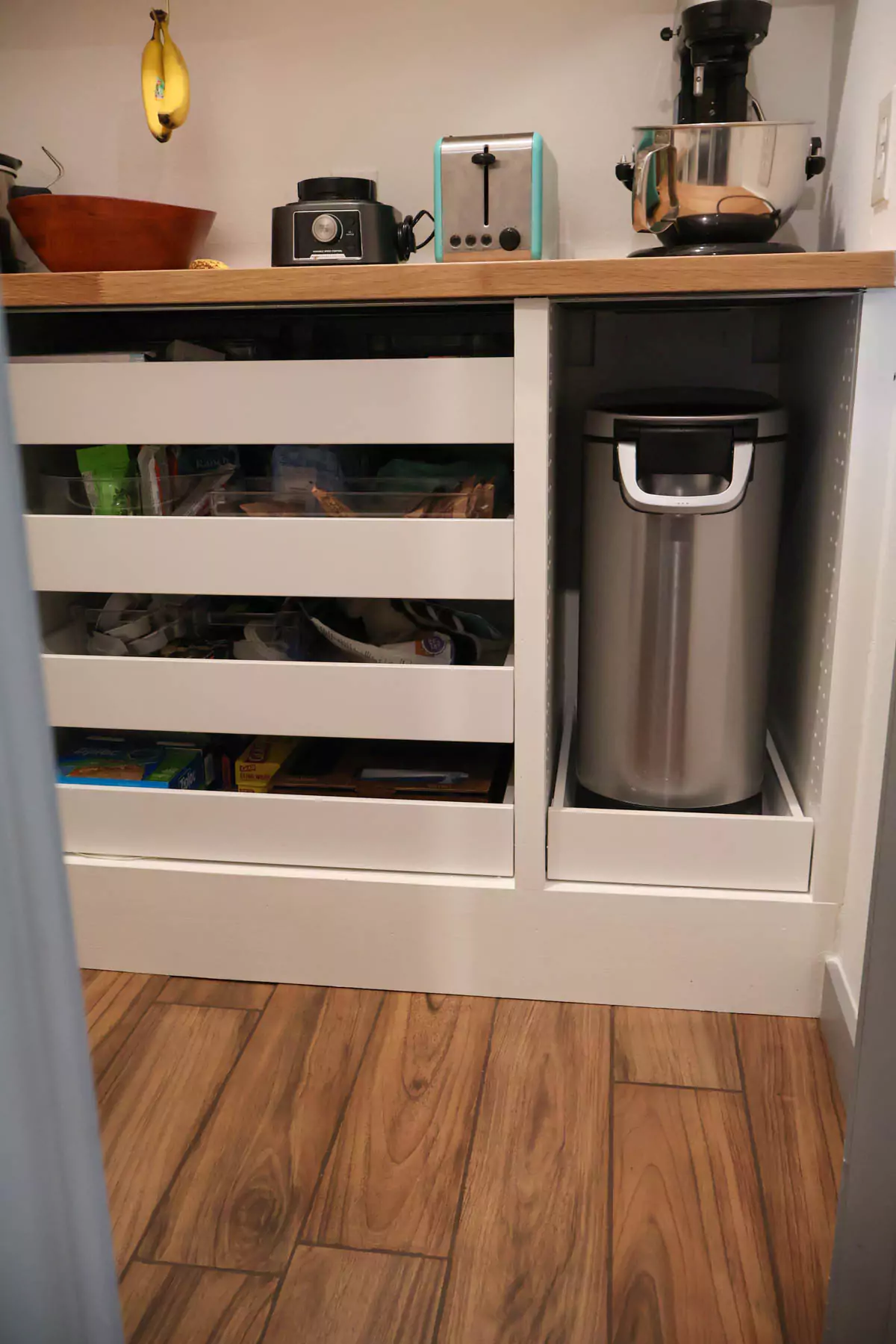 pantry drawers finished - filled the gap between drawers and the wall, then caulked
