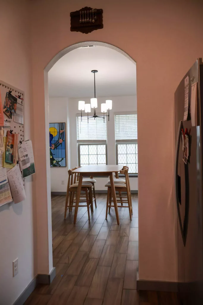 Dining room with chandelier and new table set